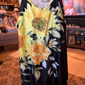 Tankini set. Brand new. Beautiful yellow floral. Black short  bottoms. 3X